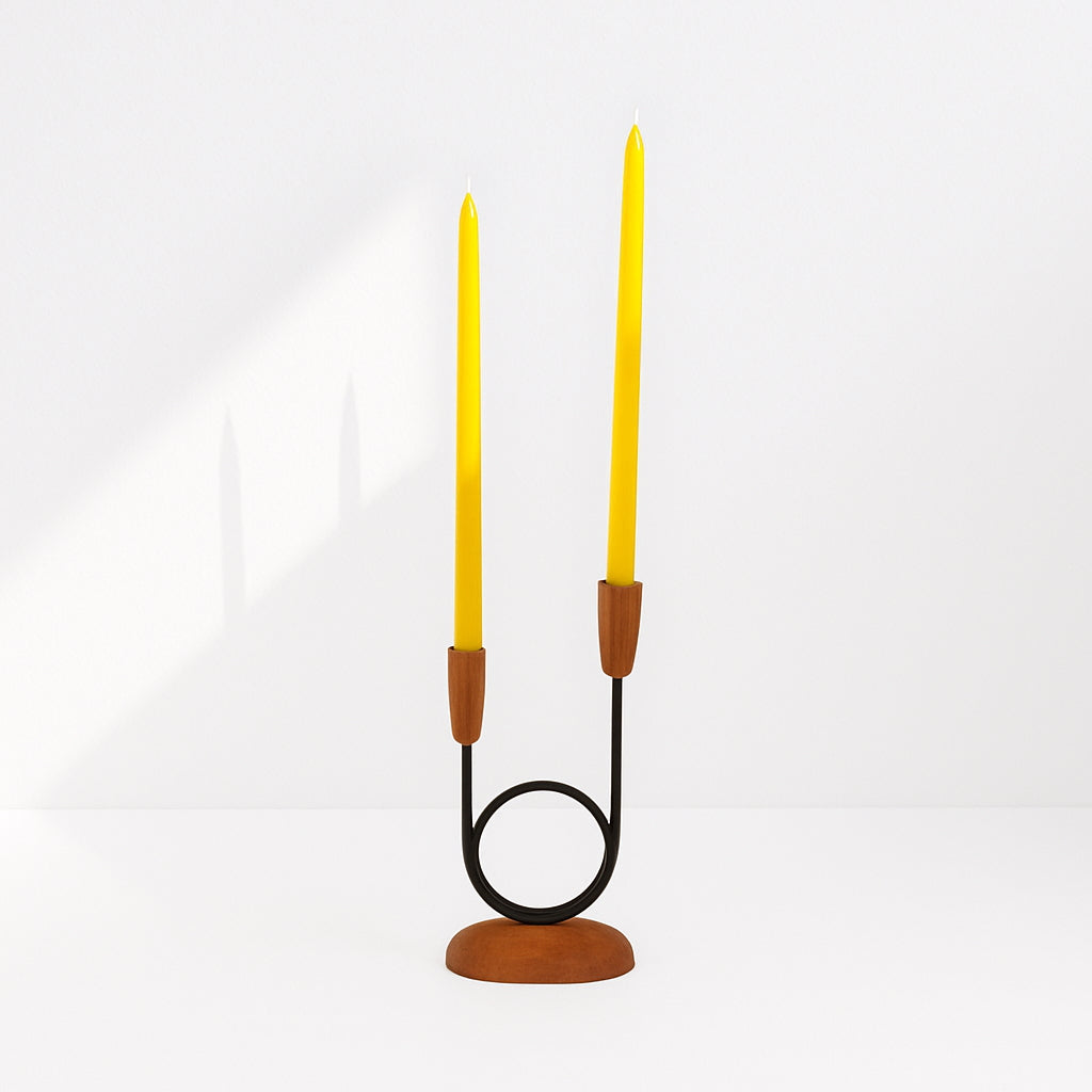 Candle holder with two beeswax 1/2" taper candles on a white background.